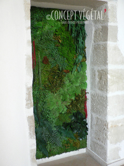 Le camouflage d'un élément qui nuit à votre décoration intérieure par le mur végétal stabilisé